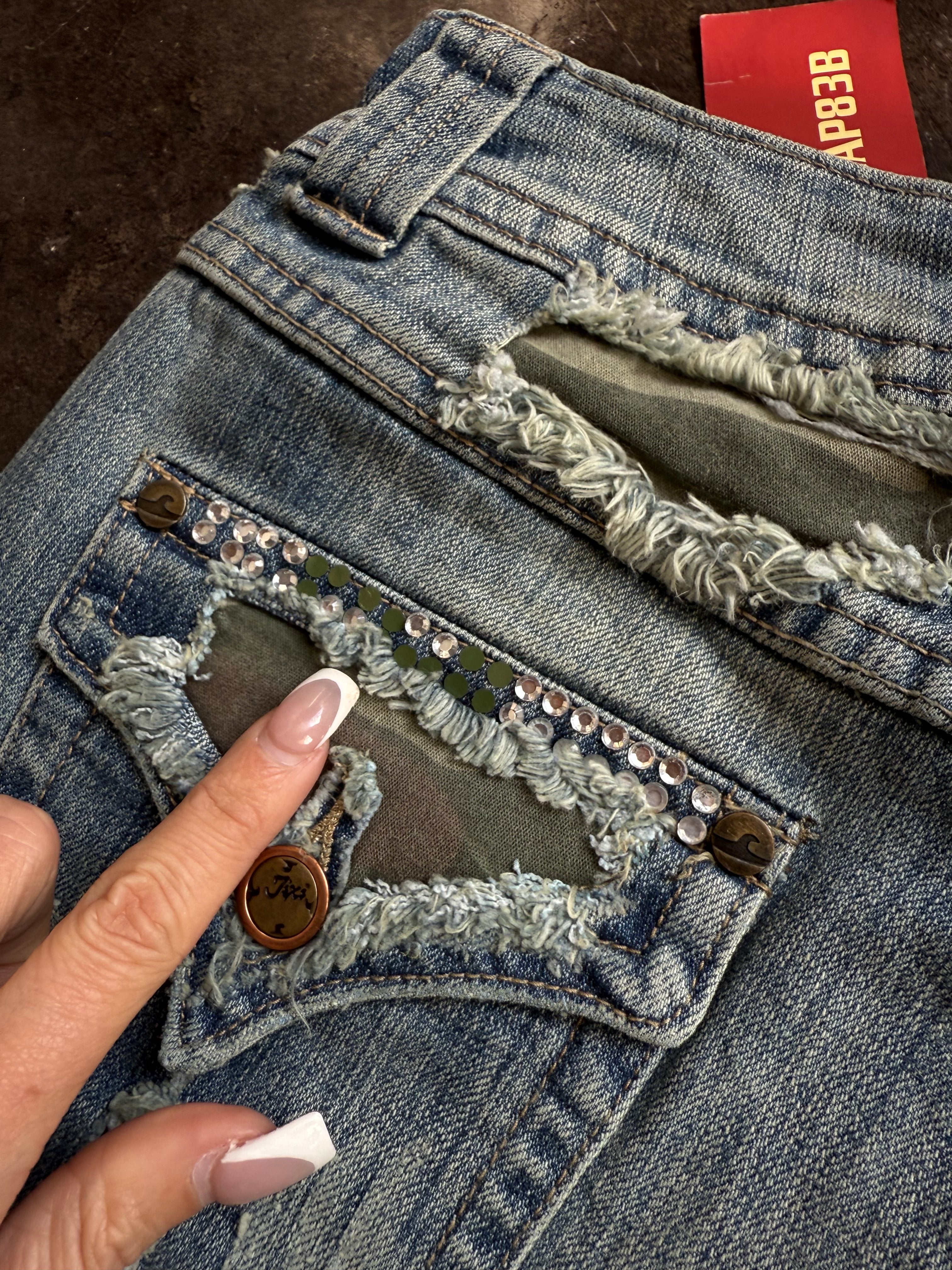 Jixi camo distressed jeans