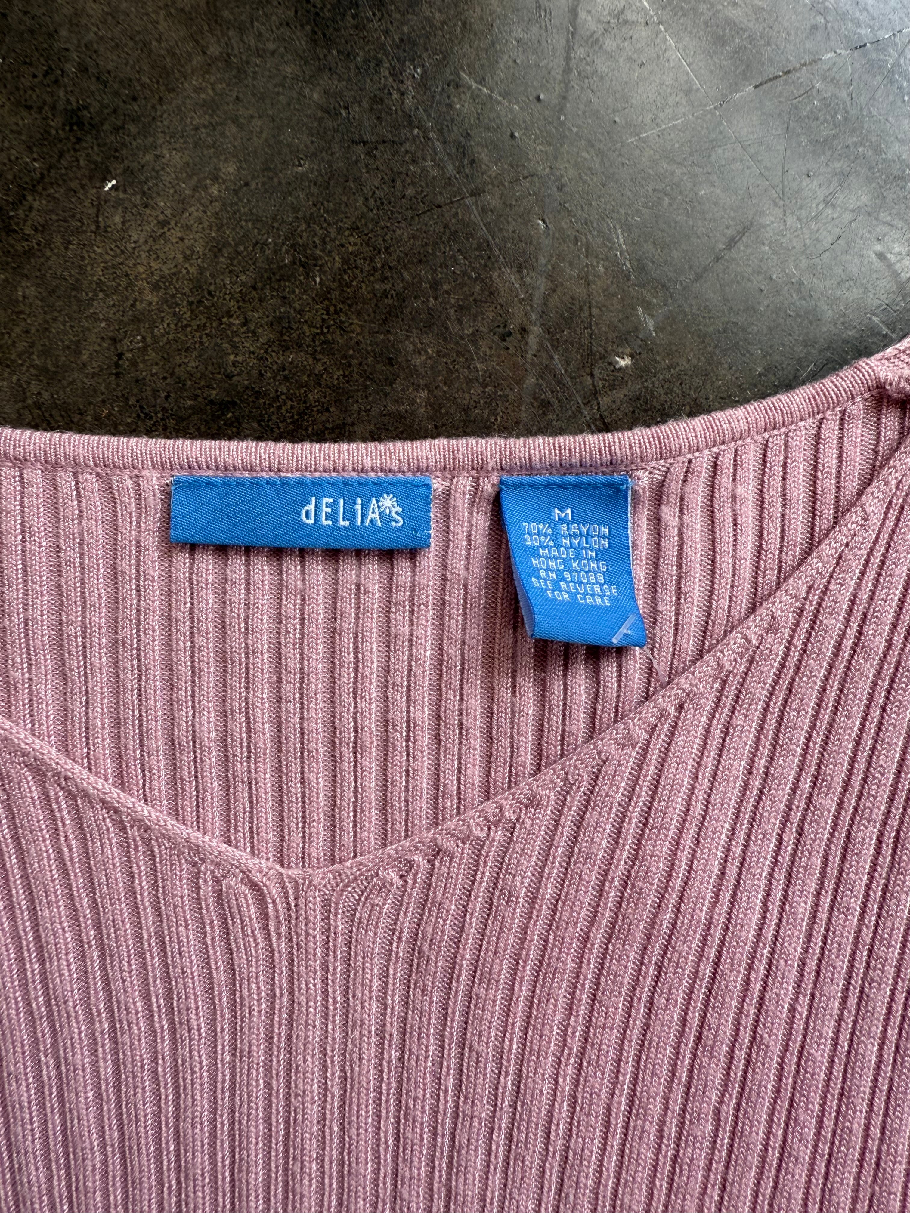 Delia’s sweater