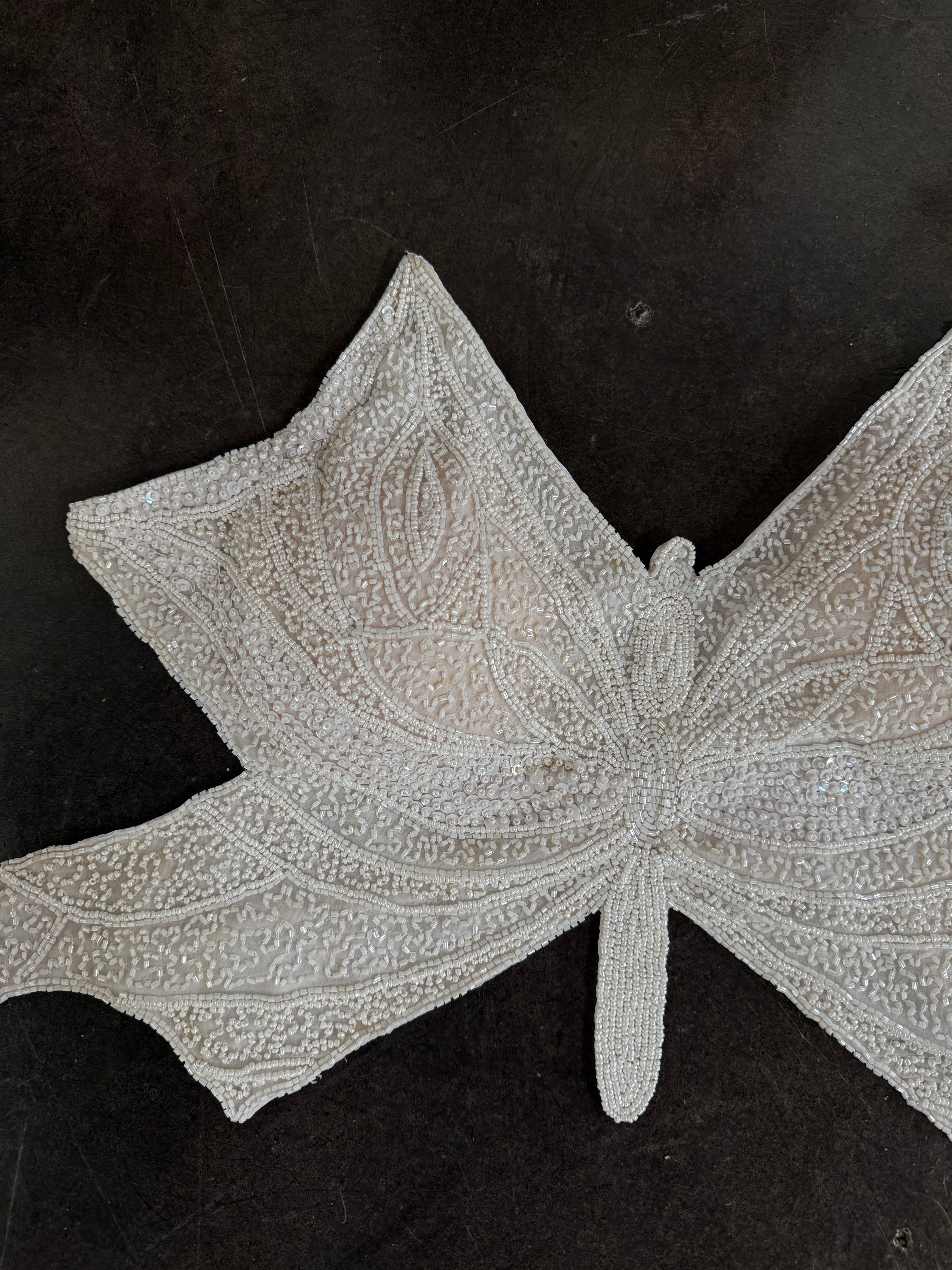 white beaded butterfly top